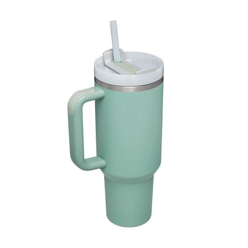 Car-friendly insulated tumbler with a handle designed for easy on-the-go transport.