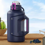 Large capacity 1180mL insulated sports kettle standing upright against an outdoor background