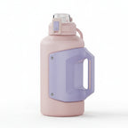 Portable fitness water jug highlighting its sturdy handle and drop-resistant build.