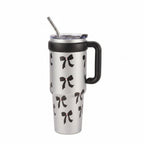 Portable metal water cup highlighting its user-friendly straw lid mechanism.