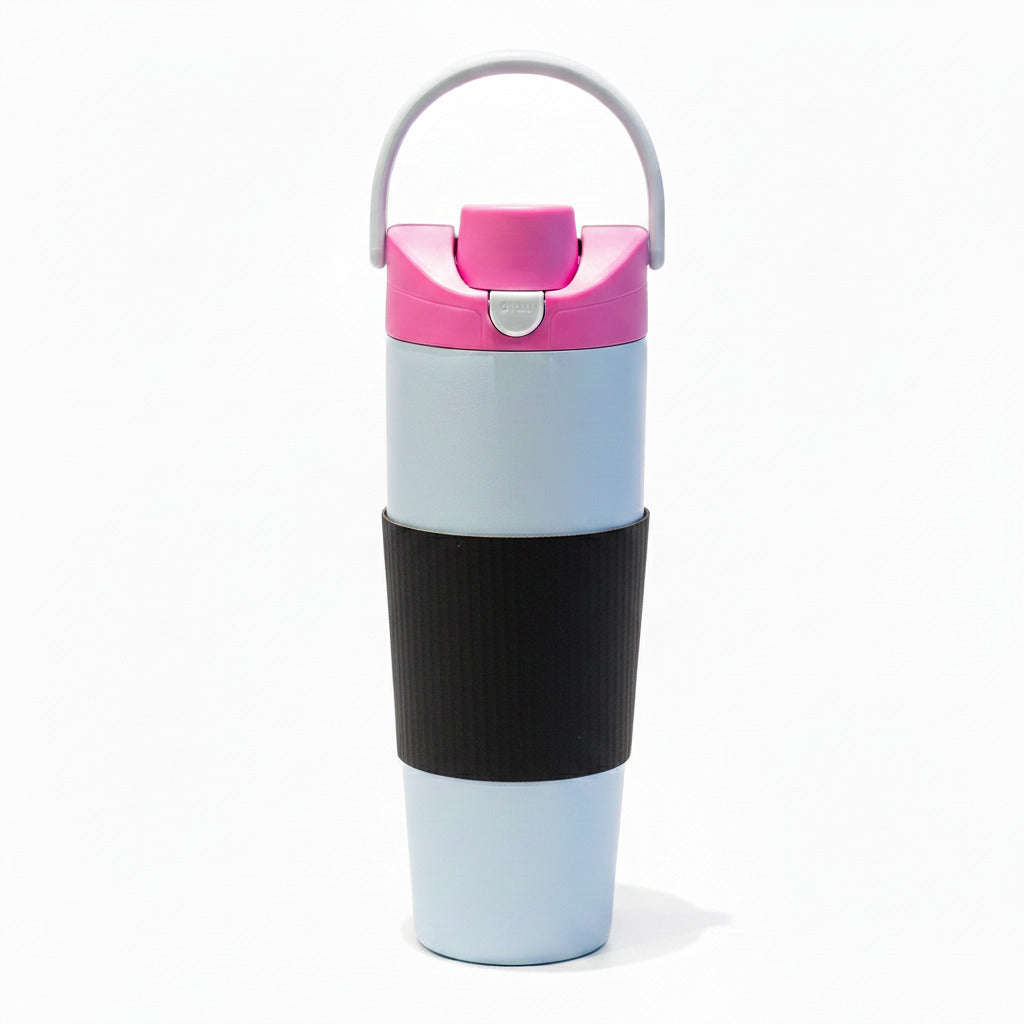 Portable sports tumbler placed inside a vehicle cup holder.